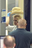 Britney Spears humbled by strict airport security at LAX **NO UK**
