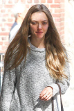 A make-up free Amanda Seyfried takes her best bud Finn for his morning walk