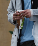 FAMEFLYNET - Exclusive: Rafferty Law Spotted With Friends Drinking And Smoking A Suspicious Cigarette At Glastonbury 2015