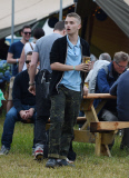 FAMEFLYNET - Exclusive: Rafferty Law Spotted With Friends Drinking And Smoking A Suspicious Cigarette At Glastonbury 2015