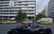 Anti-austerity banner hangs from Greek finance ministry