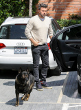 Ben Affleck jokingly tries to sic his German Shepherd on the paparazzi