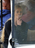 FAMEFLYNET - Exclusive: Charlize Theron Gets Caught Smoking A Cigarette On The Set Of The Huntsman