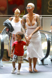 Curvy beauty Amber Rose takes her son for a Sunday matinee