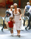 Curvy beauty Amber Rose takes her son for a Sunday matinee