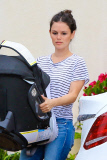 Rachel Bilson carries daughter Briar Rose to the car after a birthday party