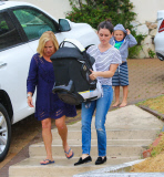 Rachel Bilson carries daughter Briar Rose to the car after a birthday party