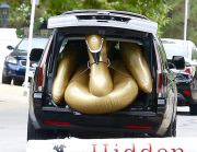 Kourtney Kardashian Heads To Kim's House With A Giant Raft 