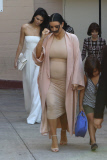 Busty Kourtney leads the pack as the Kardashians head out of the Pantages Theatre