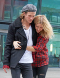 EXC: ELLIE GOULDING ARRIVES AT HEATHROW AIRPORT