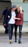 EXC: ELLIE GOULDING ARRIVES AT HEATHROW AIRPORT