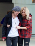 EXC: ELLIE GOULDING ARRIVES AT HEATHROW AIRPORT
