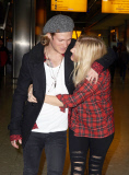 EXC: ELLIE GOULDING ARRIVES AT HEATHROW AIRPORT