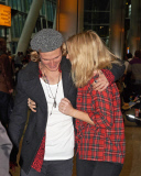 EXC: ELLIE GOULDING ARRIVES AT HEATHROW AIRPORT