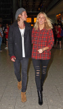 EXC: ELLIE GOULDING ARRIVES AT HEATHROW AIRPORT