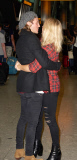 EXC: ELLIE GOULDING ARRIVES AT HEATHROW AIRPORT