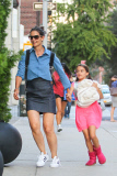Katie Holmes and Suri Cruise run home after a play date