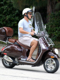 Exclusive... Tom Hanks Rides His Vespa Around Town 