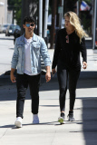 Joe Jonas and Gigi Hadid snuggle up as they prepare to adopt a pet 