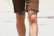 Shia LaBeouf displays his new 2Pac 'Thug Life' tattoo at the gym