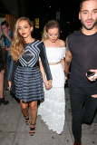 Little Mix's Perrie Edwards and Jade Thirwall celebrate at The Nice Guy