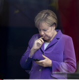 Berlin German Chancellor Angela Merkel with mobile phone