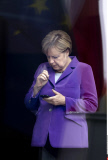 Berlin German Chancellor Angela Merkel with mobile phone