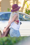 *EXCLUSIVE* Tori Spelling shows off side boob while picking up something from the drug store