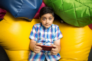 Ten-year-old Sami Akbar passes his GCSE maths exam, Oldham, Britain - 19 Aug 2015