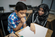 Ten-year-old Sami Akbar passes his GCSE maths exam, Oldham, Britain - 19 Aug 2015