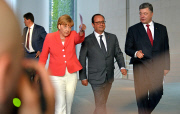 Minsker Abkommen: Merkel, Hollande und Poroschenko treffen sich in Berlin