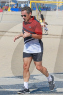 Rio de Janeiro: Nicolas Sarkozy joggt mit Bodyguard an der Copacabana