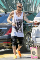 *EXCLUSIVE* Brian Austin Green wears his "Life Hurts" shirt while out shopping