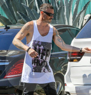 *EXCLUSIVE* Brian Austin Green wears his "Life Hurts" shirt while out shopping