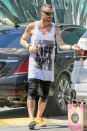 *EXCLUSIVE* Brian Austin Green wears his "Life Hurts" shirt while out shopping