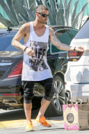 *EXCLUSIVE* Brian Austin Green wears his "Life Hurts" shirt while out shopping