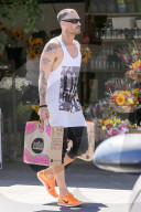 *EXCLUSIVE* Brian Austin Green wears his "Life Hurts" shirt while out shopping