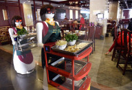 FEATURE - Roboter Restaurant:  die Roboter ersetzen den Menschen in China
