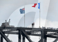 French flag flies over Sydney Harbour bridge, Sydney, Australia - 15 Nov 2015