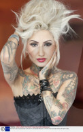 Portrait of sexy young woman with hand in hair