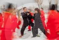 FEATURE - Chinesische Lehrer und Schüler trainieren Tai Chi im Schnee