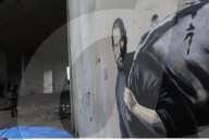 FEATURE - Steve Jobs zieht als Banksy-Graffity ins Flüchtlingscamp von Calais