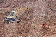 NEWS - Erdrutsch in China: Rettungsarbeiten dauern an