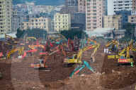 NEWS - Erdrutsch in China: Rettungsarbeiten dauern an