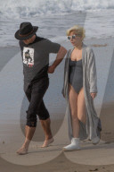 *PREMIUM EXCLUSIVE* Taylor Kinney and Lady Gaga like Quiet Walks on the Beach