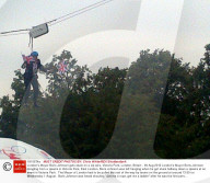 London's Mayor Boris Johnson gets stuck on a zip wire, Victoria Park, London, Britain - 06 Aug 2012