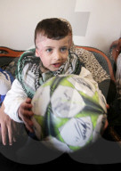 NEWS - Kriegsverletzer "Ronaldo-Bub" ist wieder daheim in West Bank