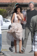 Alessandra Ambrosio does a photoshoot by the ocean