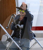 Johnny Depp Leaving Brisbane Airport With Injured Hand