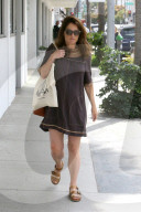 Robin Tunney flaunts a large baby bump while heading out to lunch